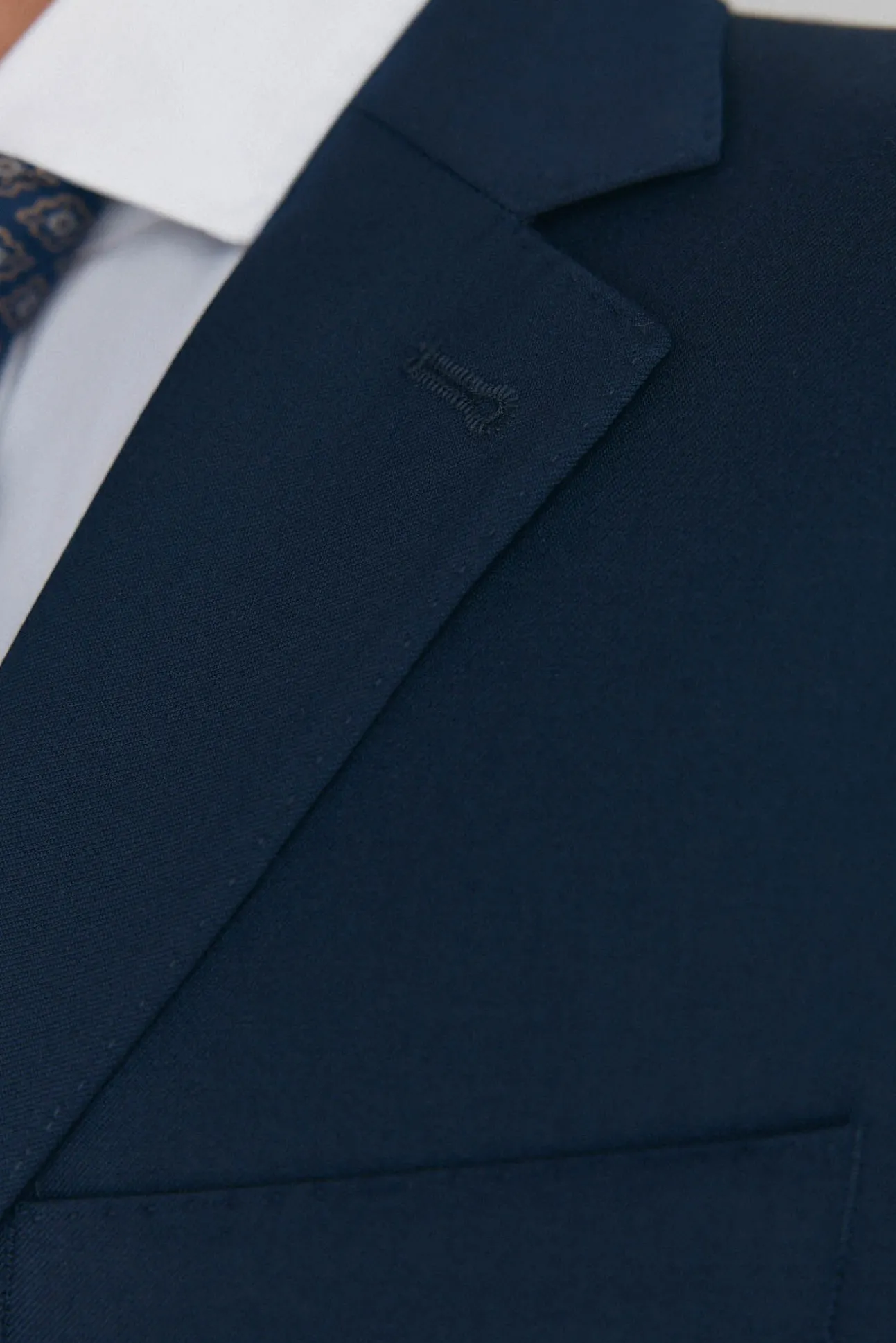 Blazer bi-elástico liso e sob medida