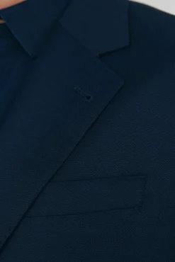Blazer estilo olho de pássaro com dois elásticos e corte slim