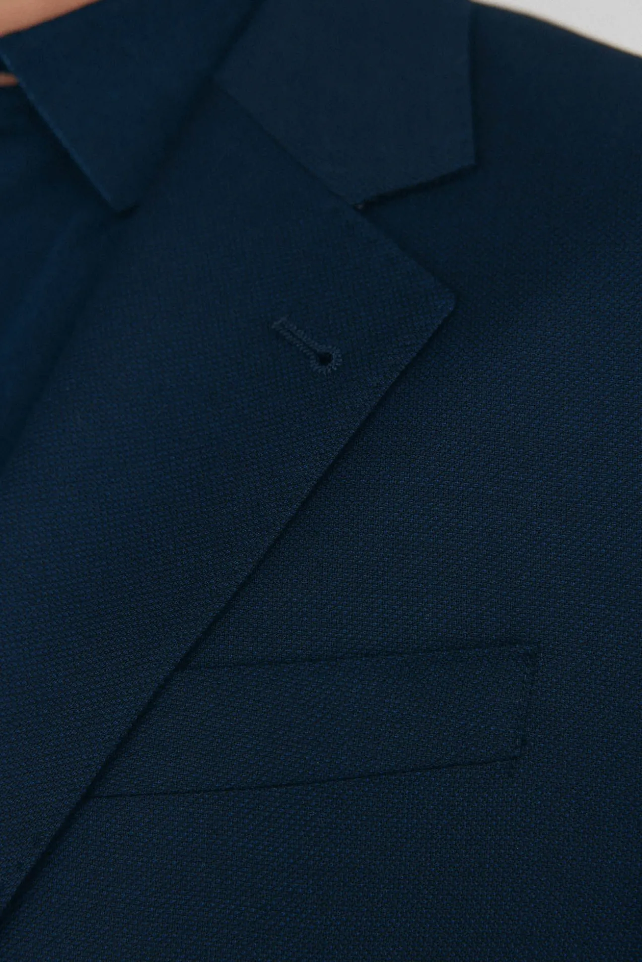 Blazer estilo olho de pássaro com dois elásticos e corte slim