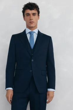 Blazer estruturado com costas azuis e corte sob medida