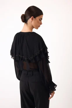 Blusa capa bordada