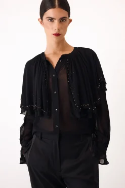 Blusa capa bordada