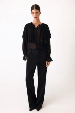 Blusa capa bordada