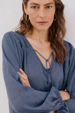Blusa com borlas