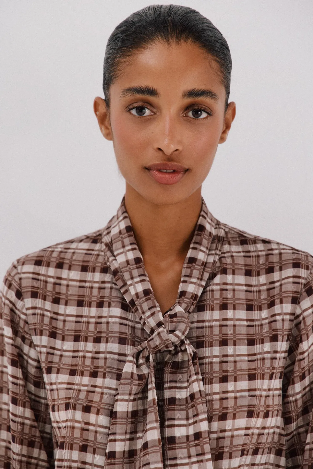 Blusa com laço estampa xadrez