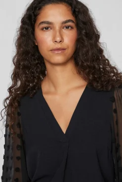 Blusa com plumeti nas mangas