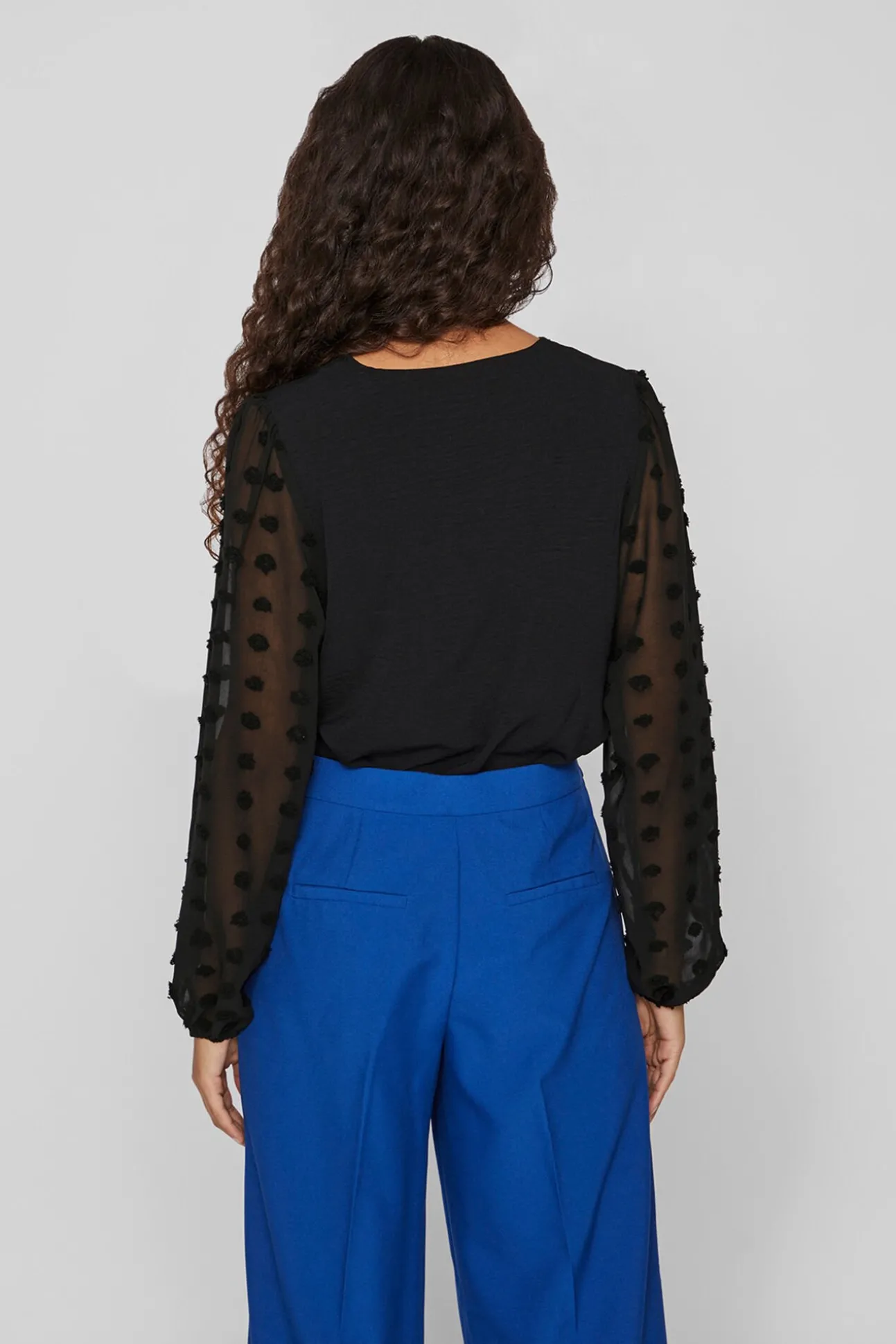 Blusa com plumeti nas mangas
