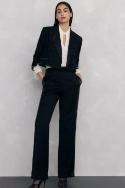 Blusa com punhos de penas