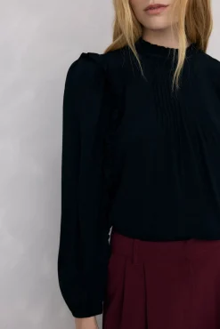 Blusa de chiffon com babados