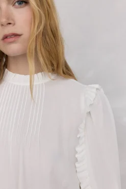 Blusa de chiffon com babados