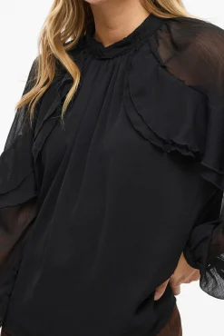 Blusa de chiffon com babados