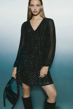Blusa de lurex com cós elástico