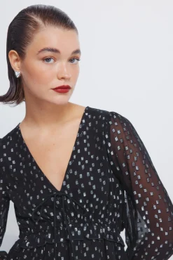Blusa de lurex com cós elástico