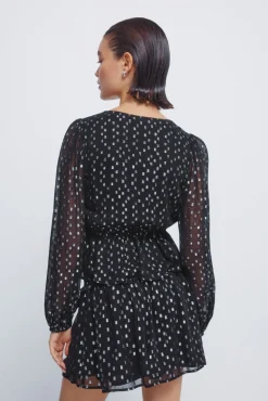 Blusa de lurex com cós elástico