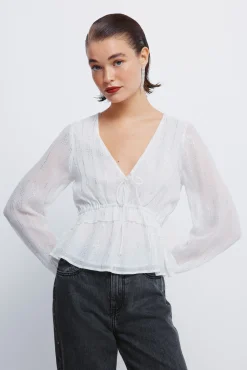 Blusa de lurex com cós elástico