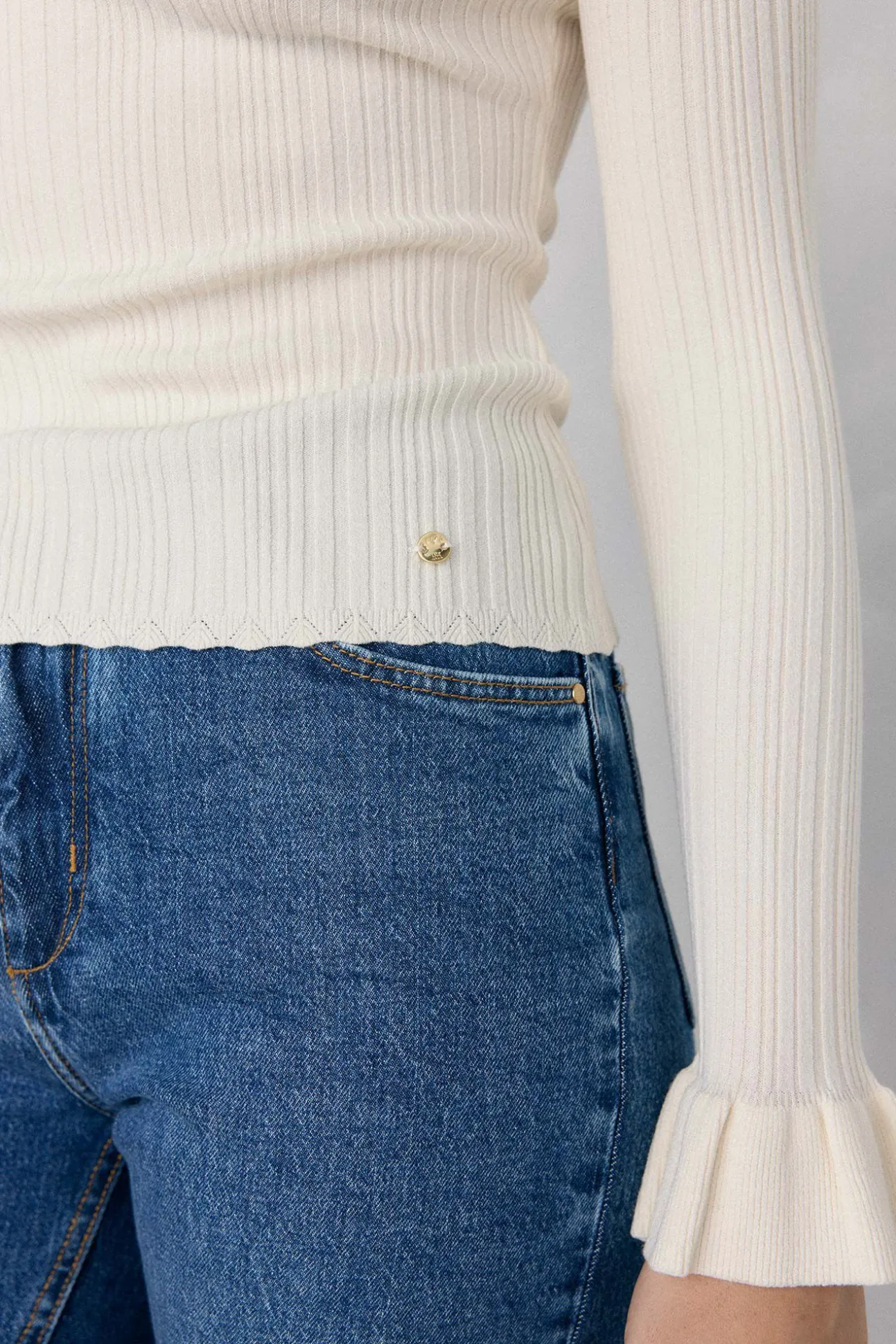 Blusa de malha com folho