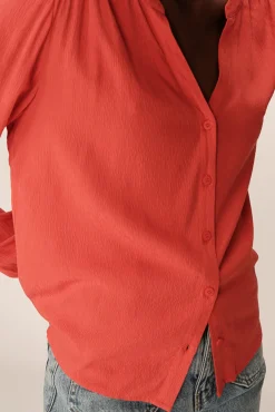 Blusa de mangas comprida com corte regular
