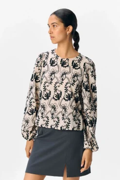 Blusa de tecido bordado