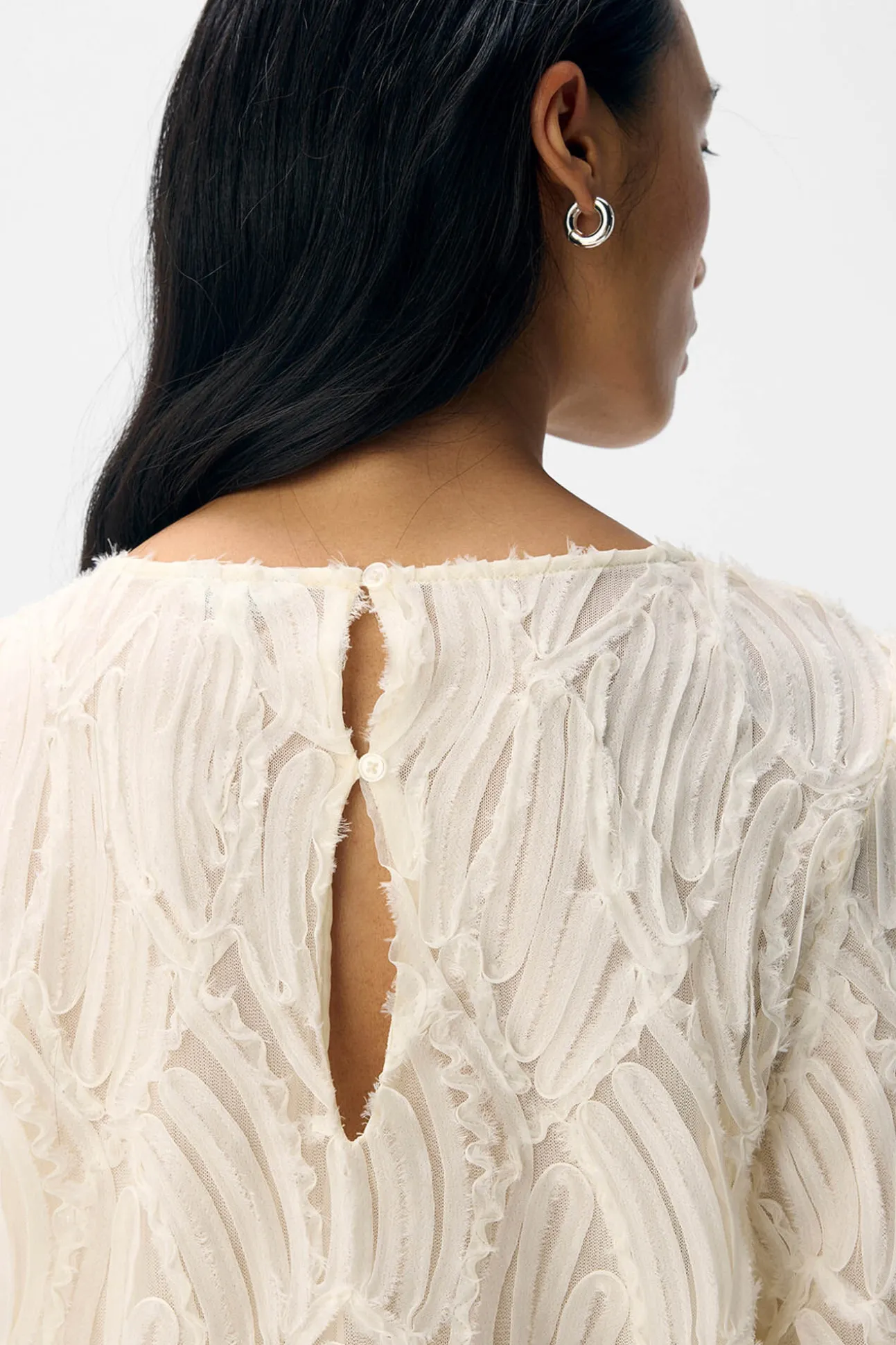 Blusa de tecido texturizado