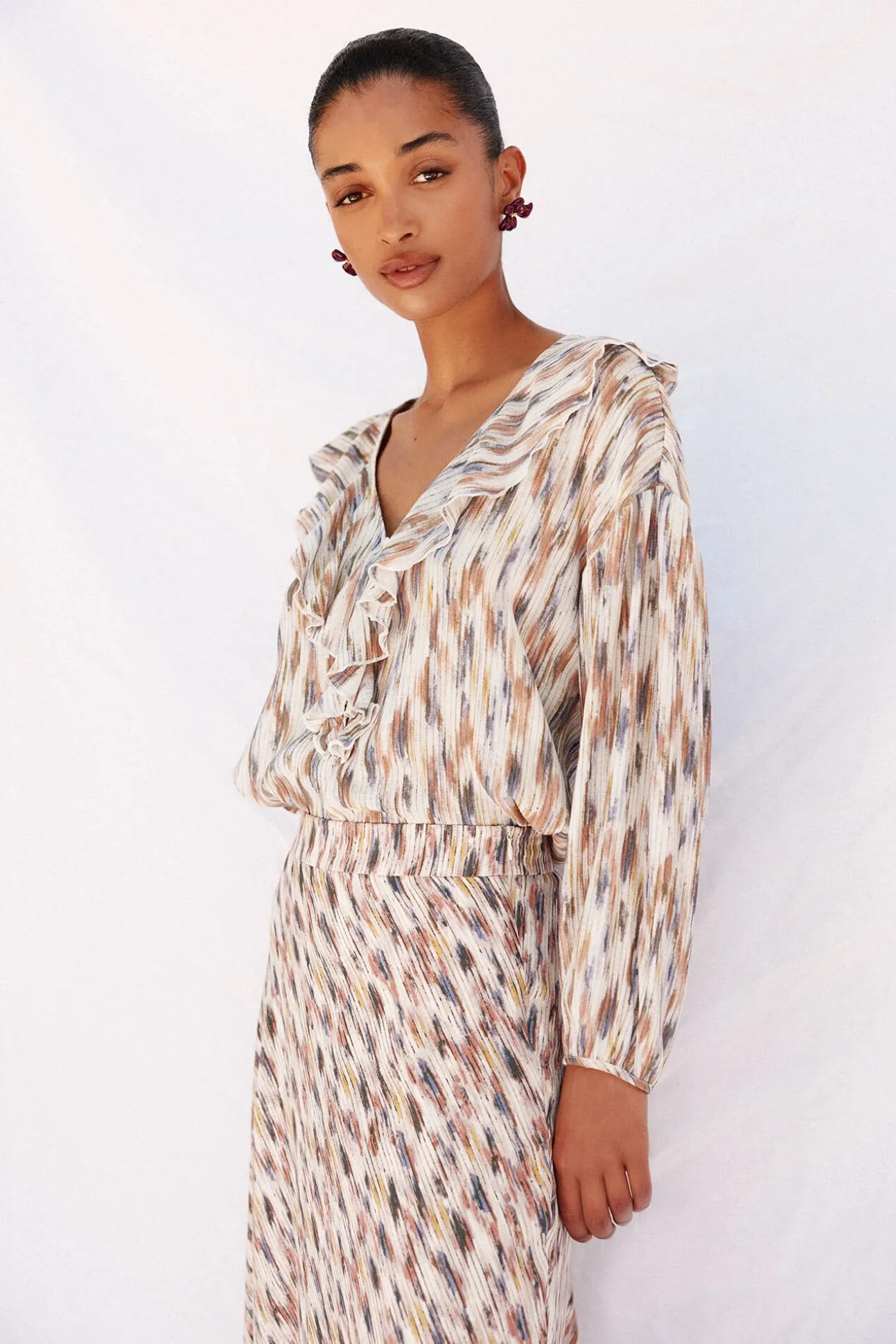 Blusa estampada com folhos
