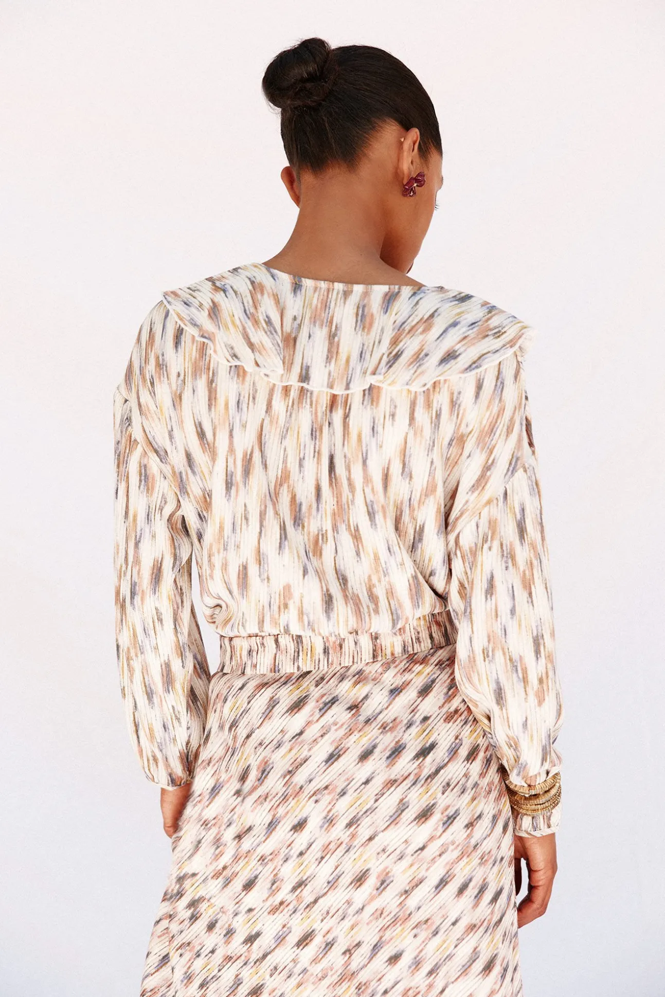Blusa estampada com folhos