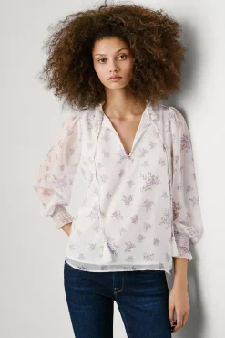 Blusa floral de manga comprida