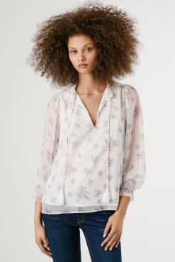 Blusa floral de manga comprida