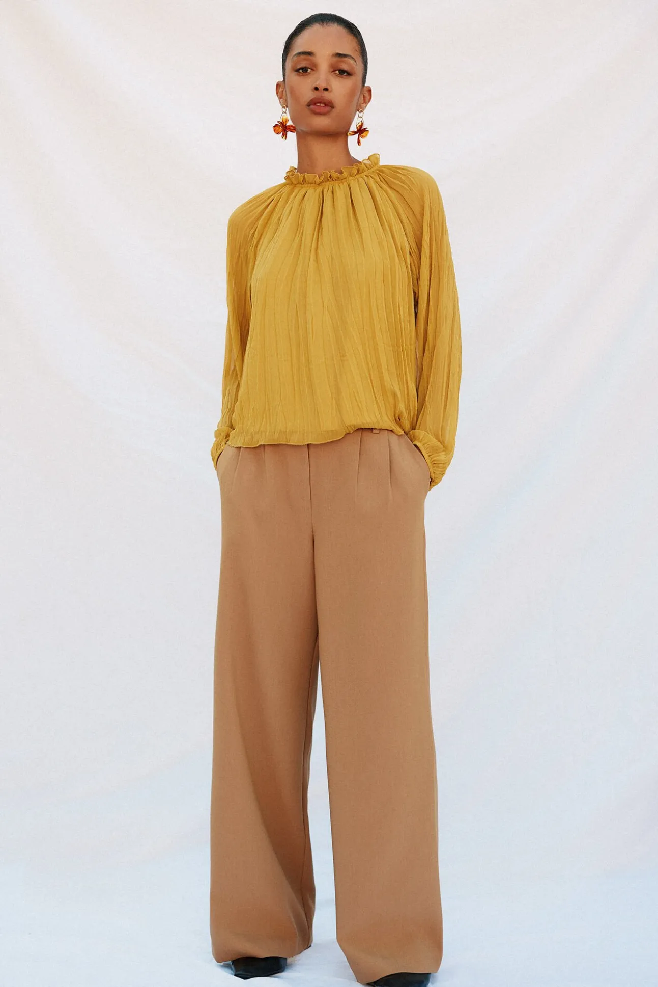 Blusa fluida e franzida