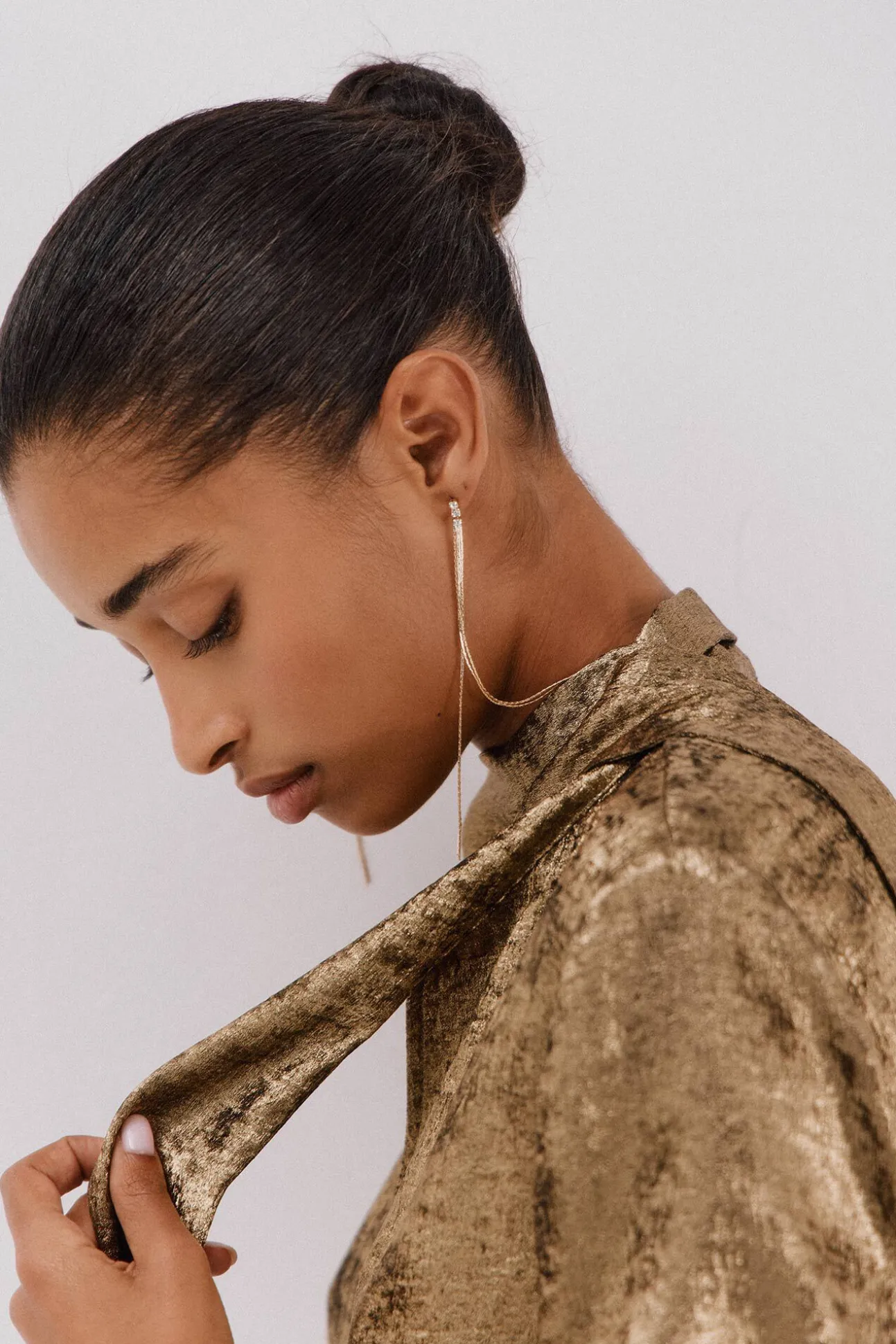 Blusa laço efeito dourado