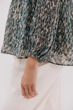 Blusa plissada contrastante