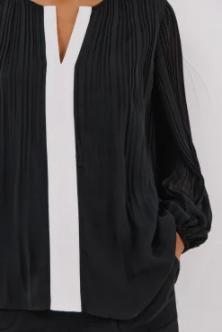 Blusa plissada contrastante