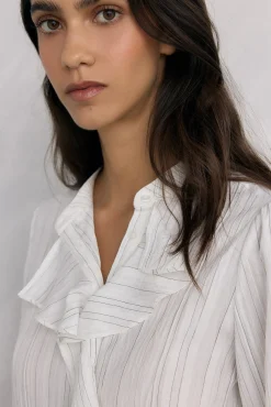 Blusa riscas com folho