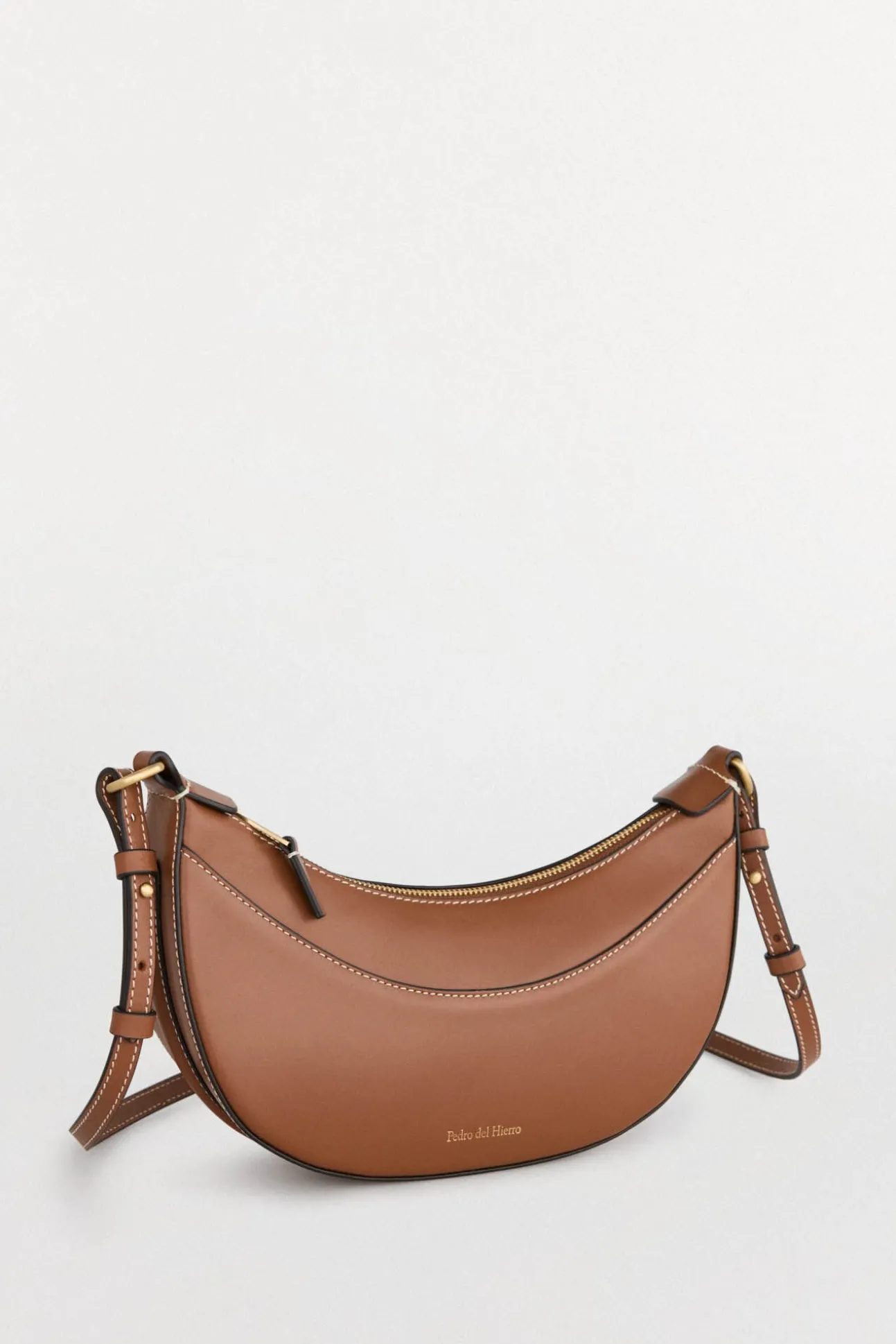 Bolsa de mala de tiracolo oval de pele