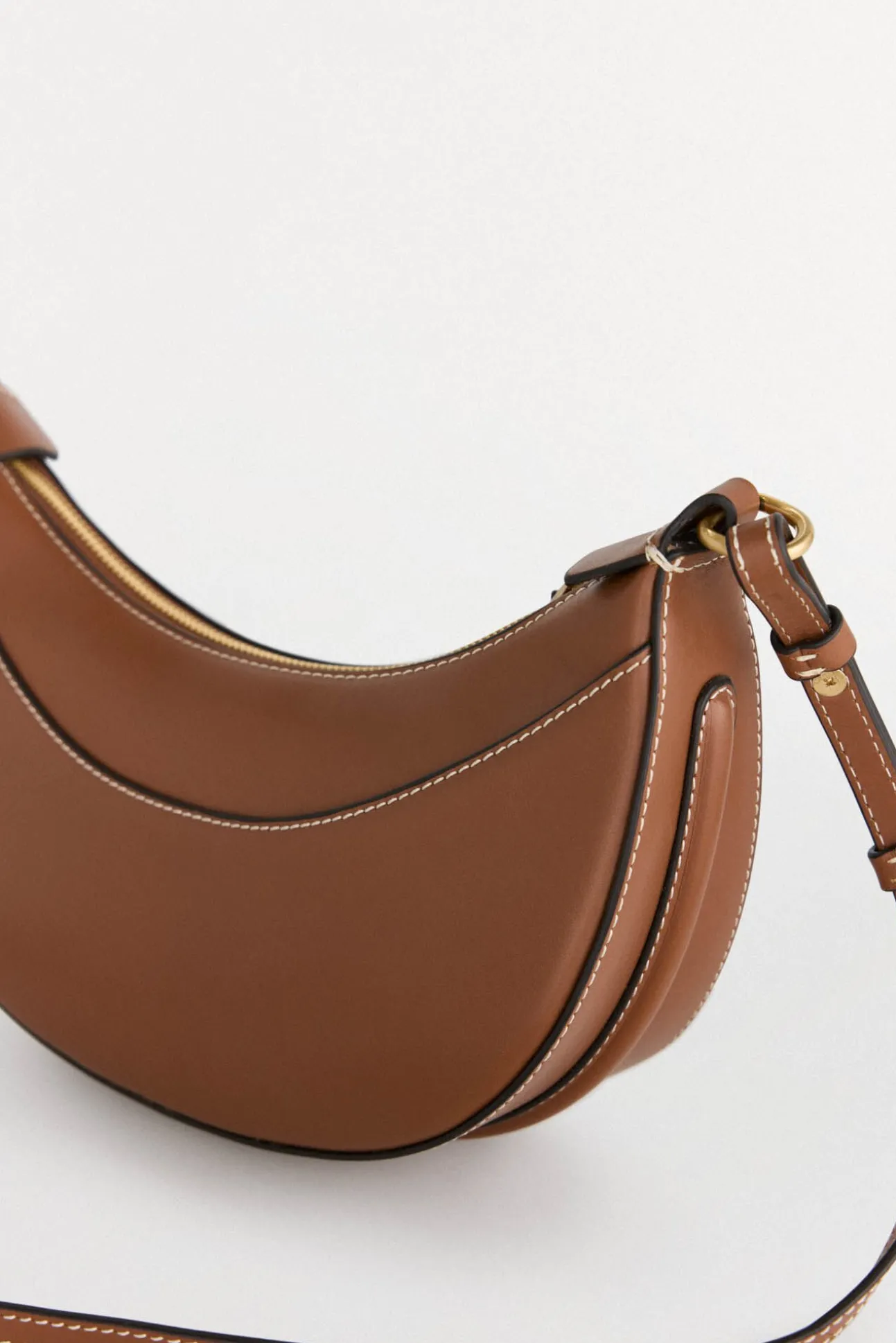 Bolsa de mala de tiracolo oval de pele