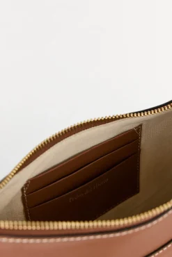 Bolsa de mala de tiracolo oval de pele