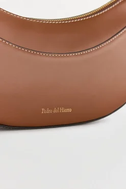 Bolsa de mala de tiracolo oval de pele