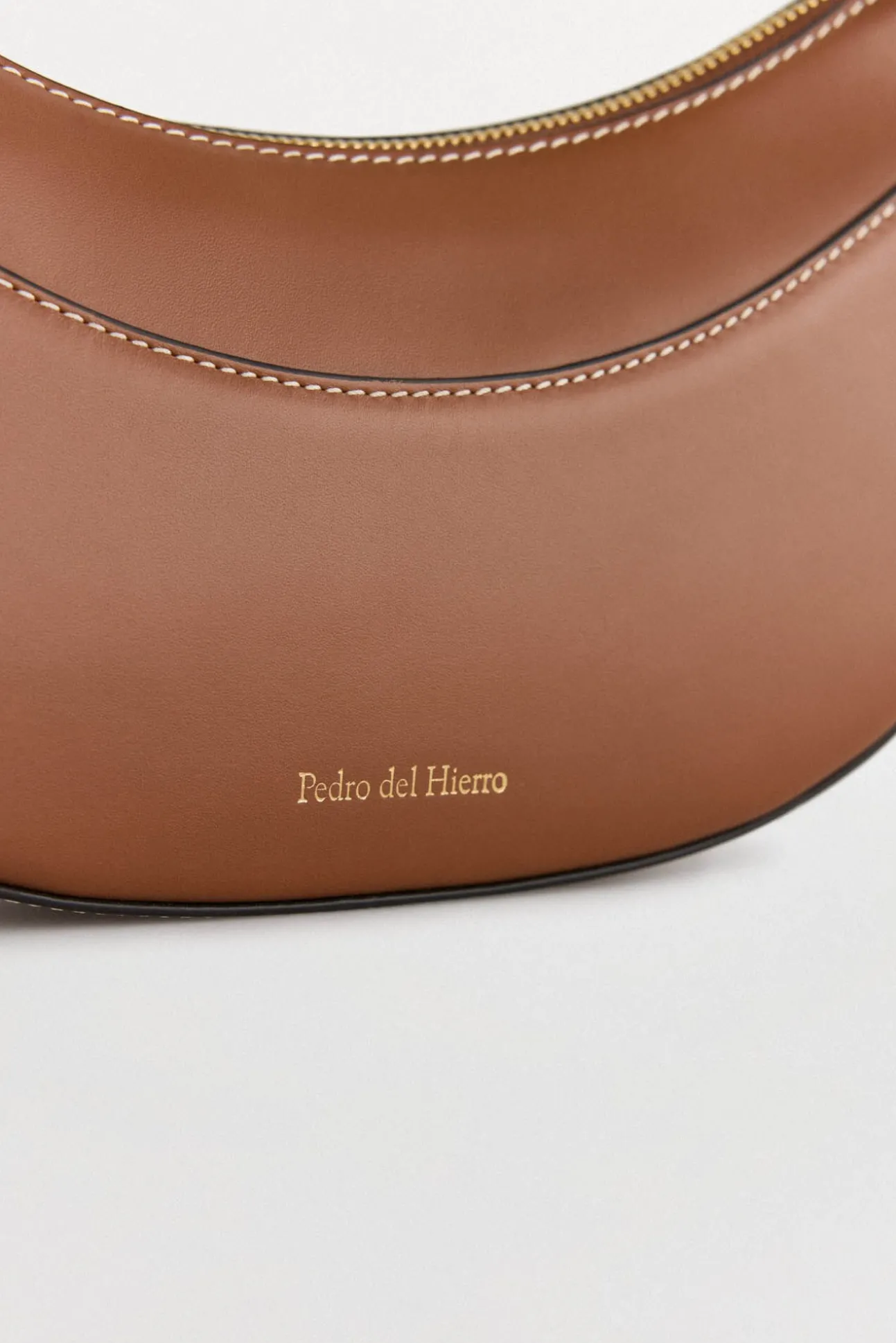 Bolsa de mala de tiracolo oval de pele