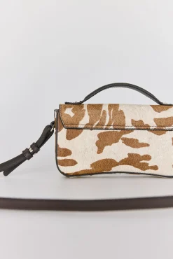 Bolsa de mala de tiracolo com estampado de vaca marrom (pele)