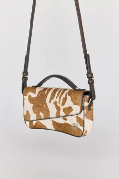 Bolsa de mala de tiracolo com estampado de vaca marrom (pele)
