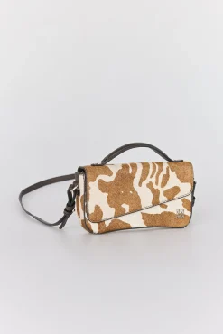 Bolsa de mala de tiracolo com estampado de vaca marrom (pele)