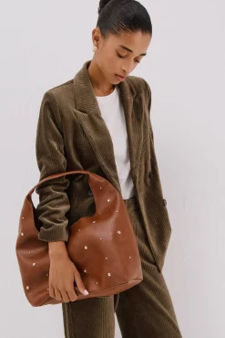 Bolsa hobo cravejada