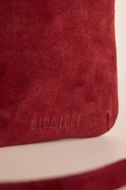 Bolsa para telefone com tachas