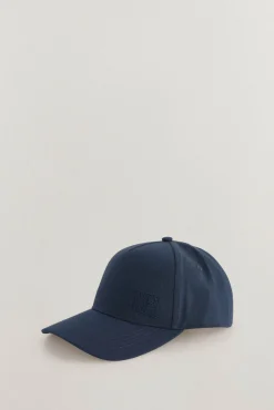Boné com viseira de têxtil