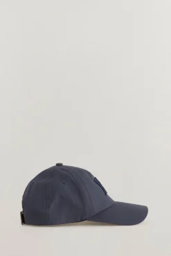 Boné com viseira de têxtil