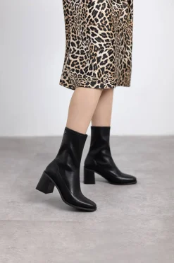 Bota de salto alto
