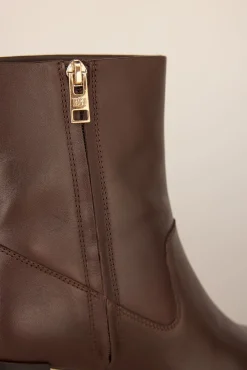 Bota de salto em Botins napa