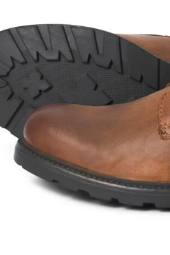 Botins de cano alto de couro