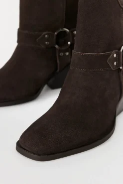 Botins de pele de cowboy com aro e tachas