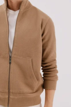 -Regular fit-Structured fleece fabric-Front zip fastening and kangaroo pockets-By buying our cotton products, you're supporting our investment in the Better Cotton Initiative. This product is sourced via a system of mass balance and therefo