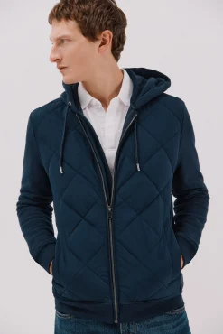-Regular fit-Sweatshirt fabric combined with technical fabric-Front zip fastening, hood and side pockets-By purchasing our cotton products, you are supporting our investment in the Better Cotton initiative. This product has been obtained th